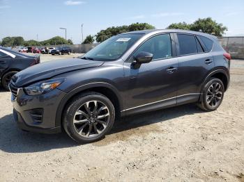  Salvage Mazda Cx