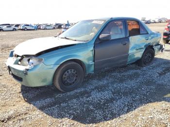  Salvage Mazda Protege
